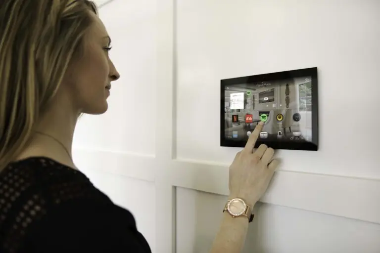 Wall-mounted Control4 touchscreen interface