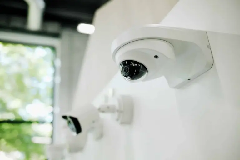 Exterior security camera mounted on a residential wall