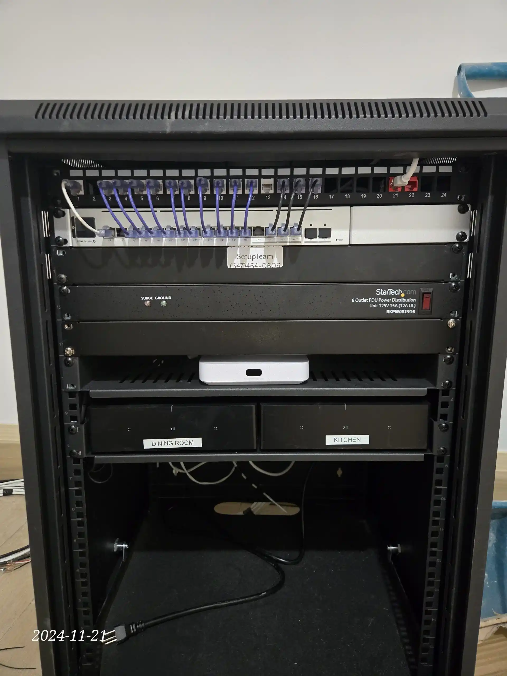UniFi network rack with structured wiring and audio distribution